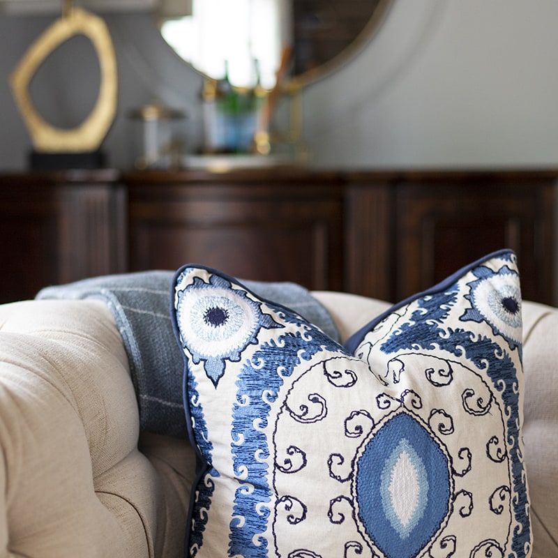 Patterned pillow on couch